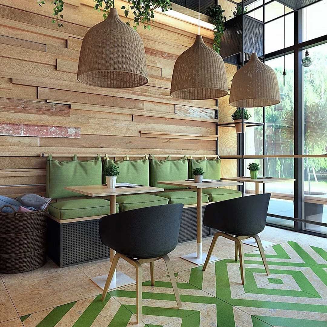 Cafetería industrial con barra de mármol